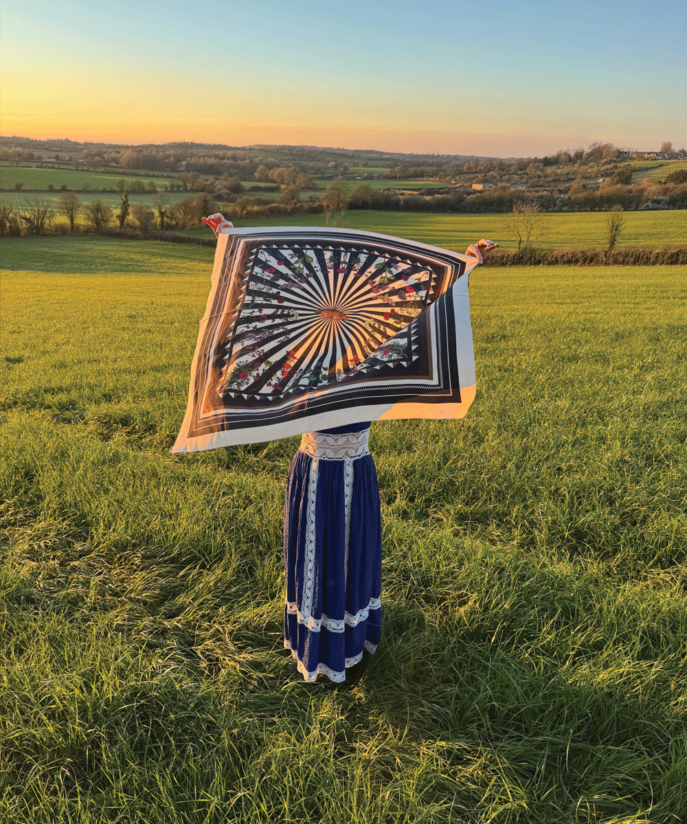 Floral Moth cream silk scarf by Silken Favours — illustrated moth and floral design with black stripes, made in Britain