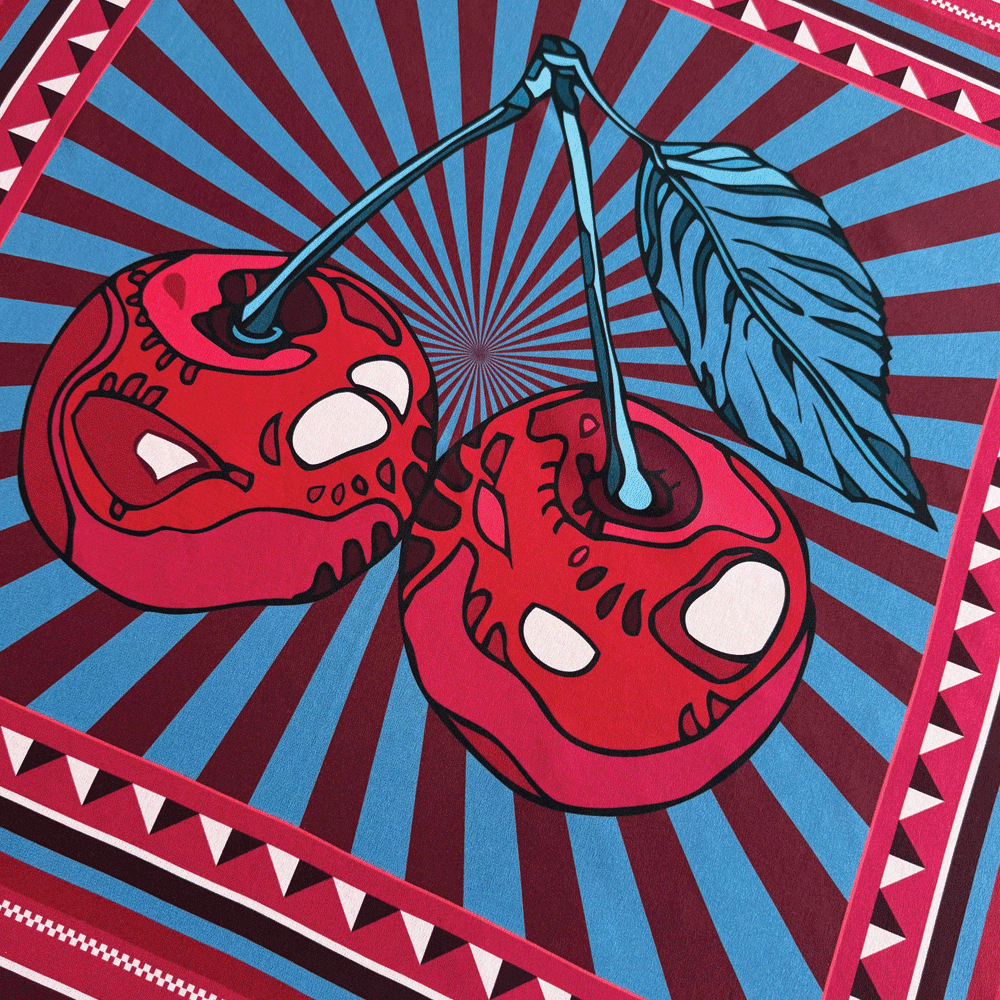 Blue Cherry Pop silk scarf by Silken Favours — bold red and blue graphic cherry print, made in Britain